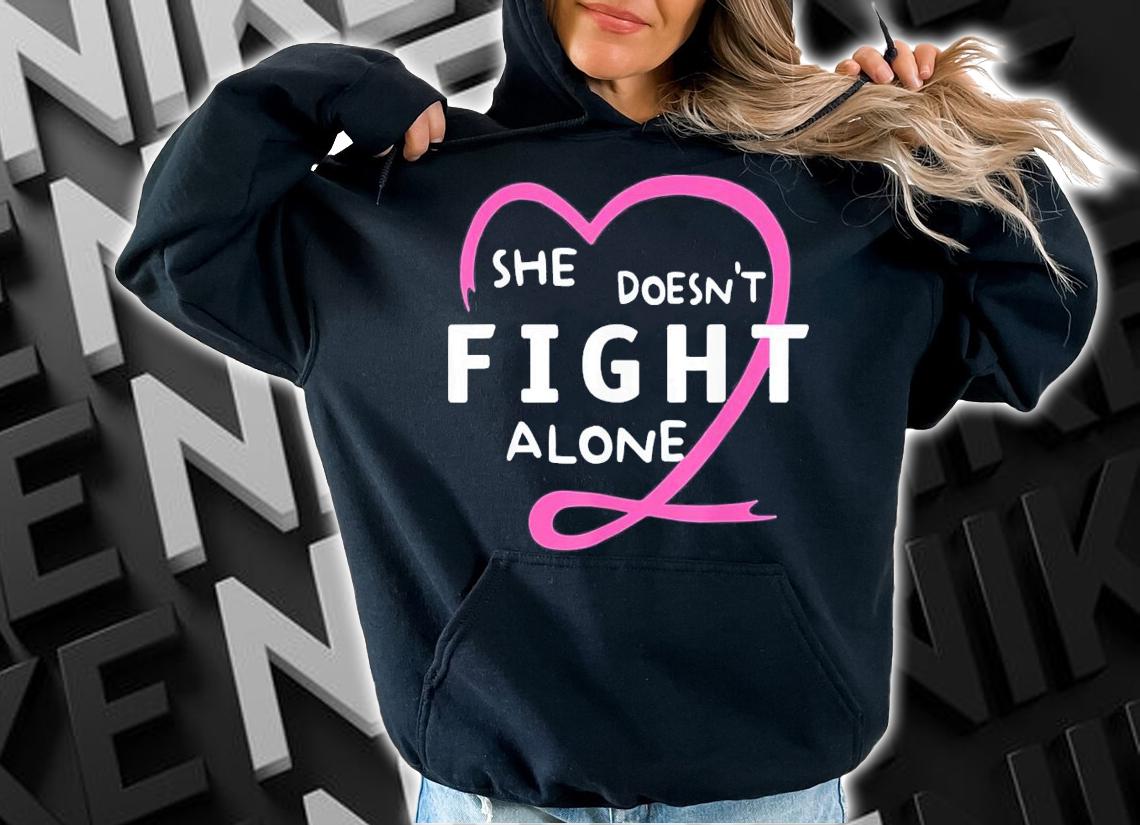 She Doesn't Fight Alone Breast Cancer Awareness Support T-Shirt t-shirt