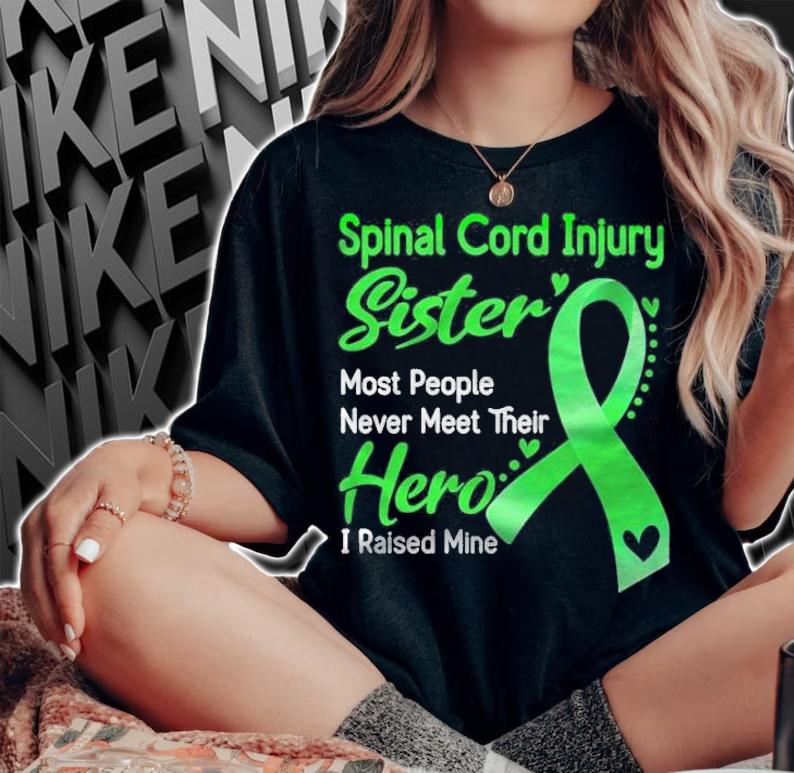 Spinal cord injury sister most people never meet their hero i raise mine shirt woman shirt