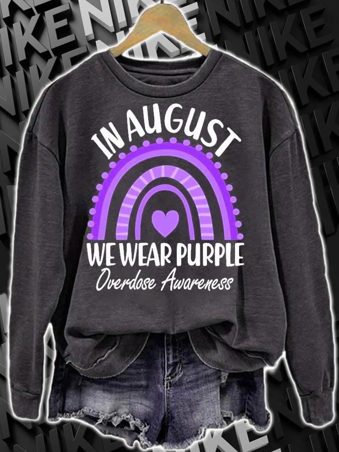 In August we wear purple overdose awareness purple rainbow T-shirt sweatshirt