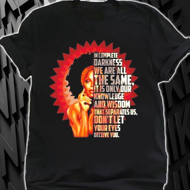 Janet Jackson in complete darkness we are all the same it is only our shirt shirt
