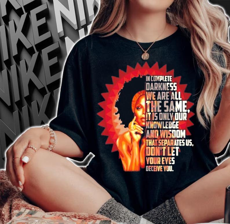 Janet Jackson in complete darkness we are all the same it is only our shirt woman shirt